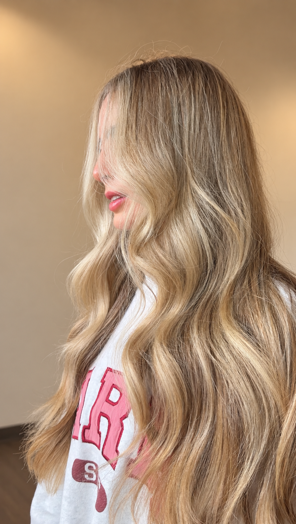Long dimensional blonde waves created by Hannah